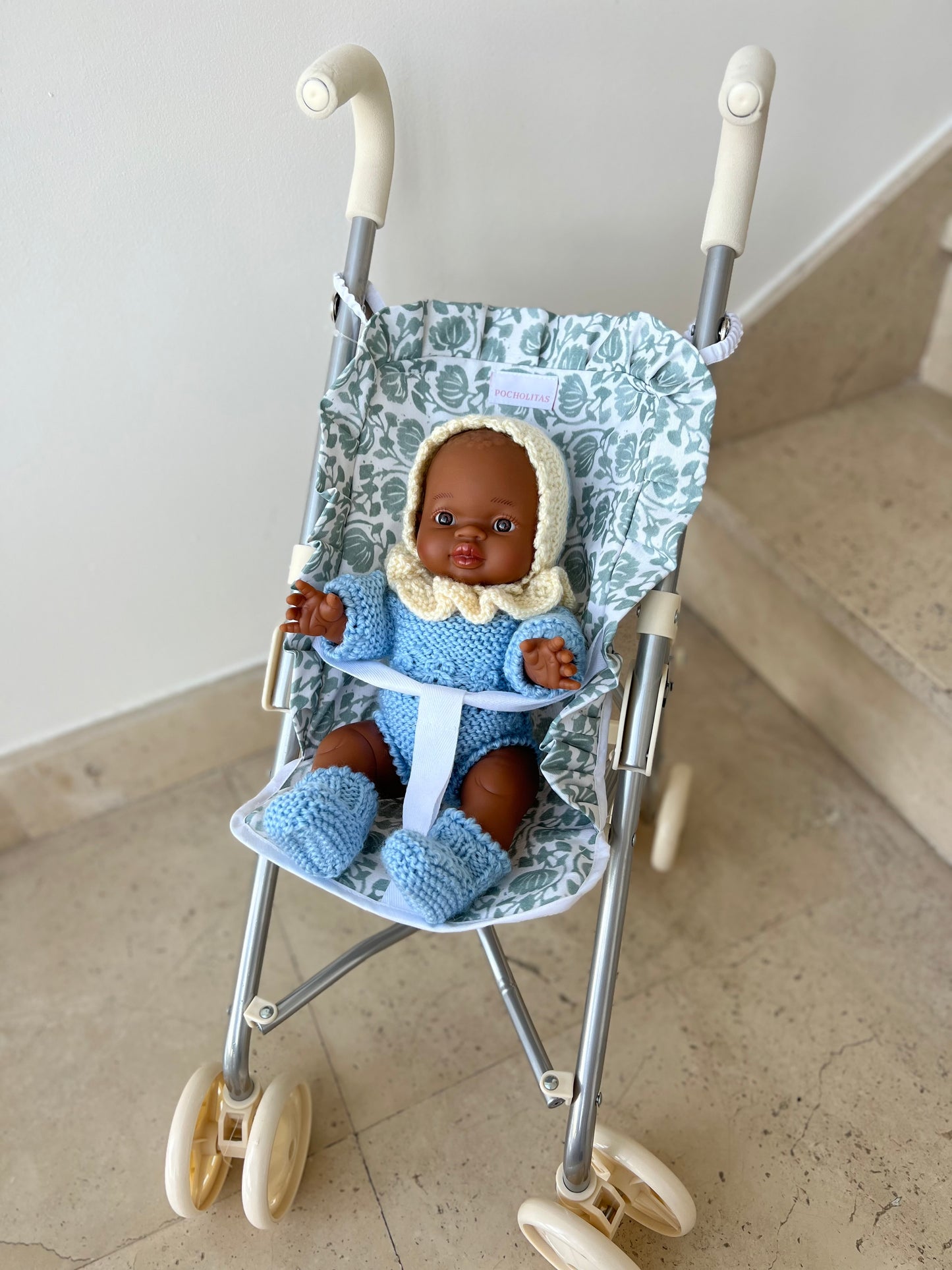 Silleta ligera plastificada azul de flores