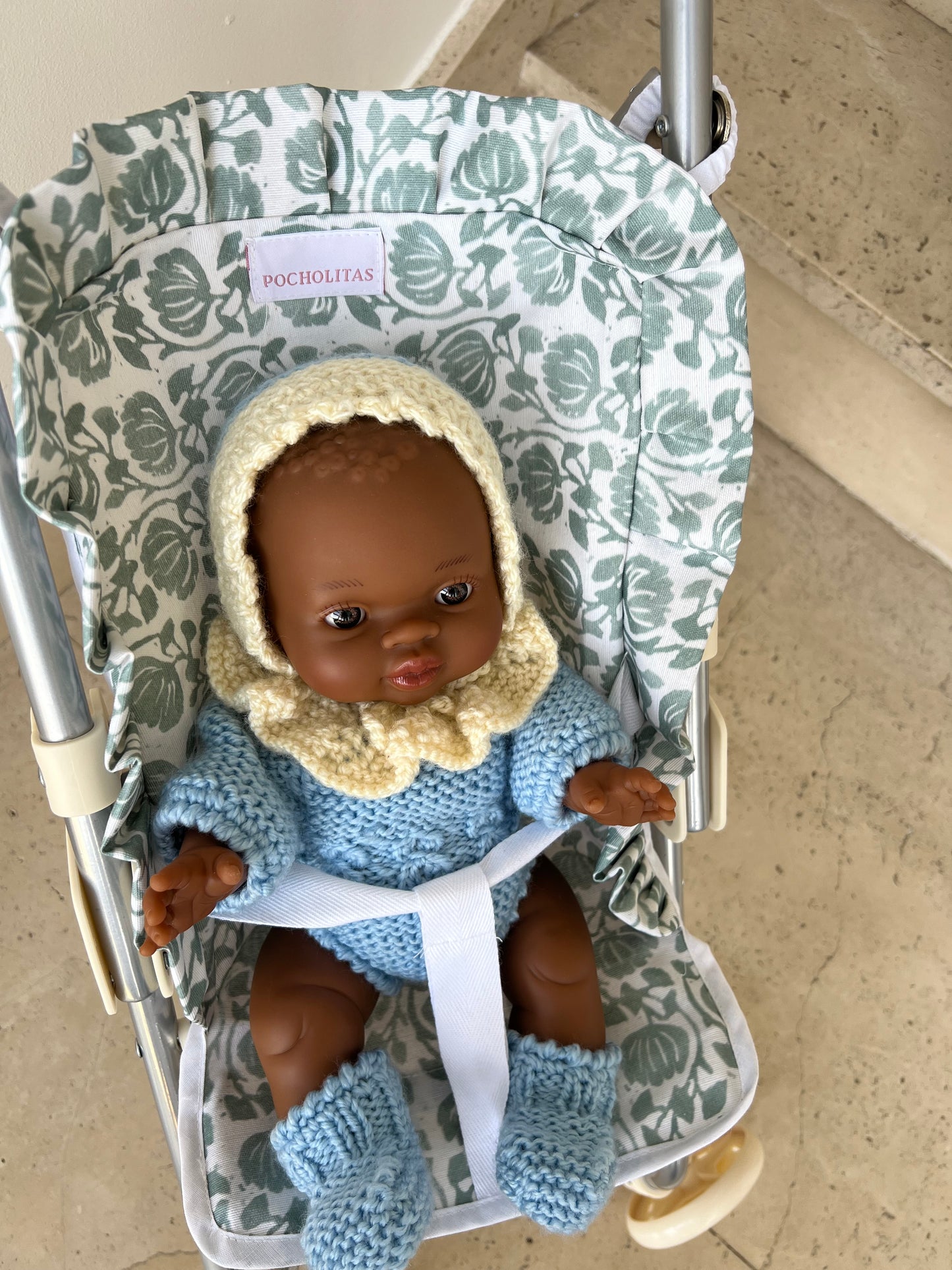 Silleta ligera plastificada azul de flores