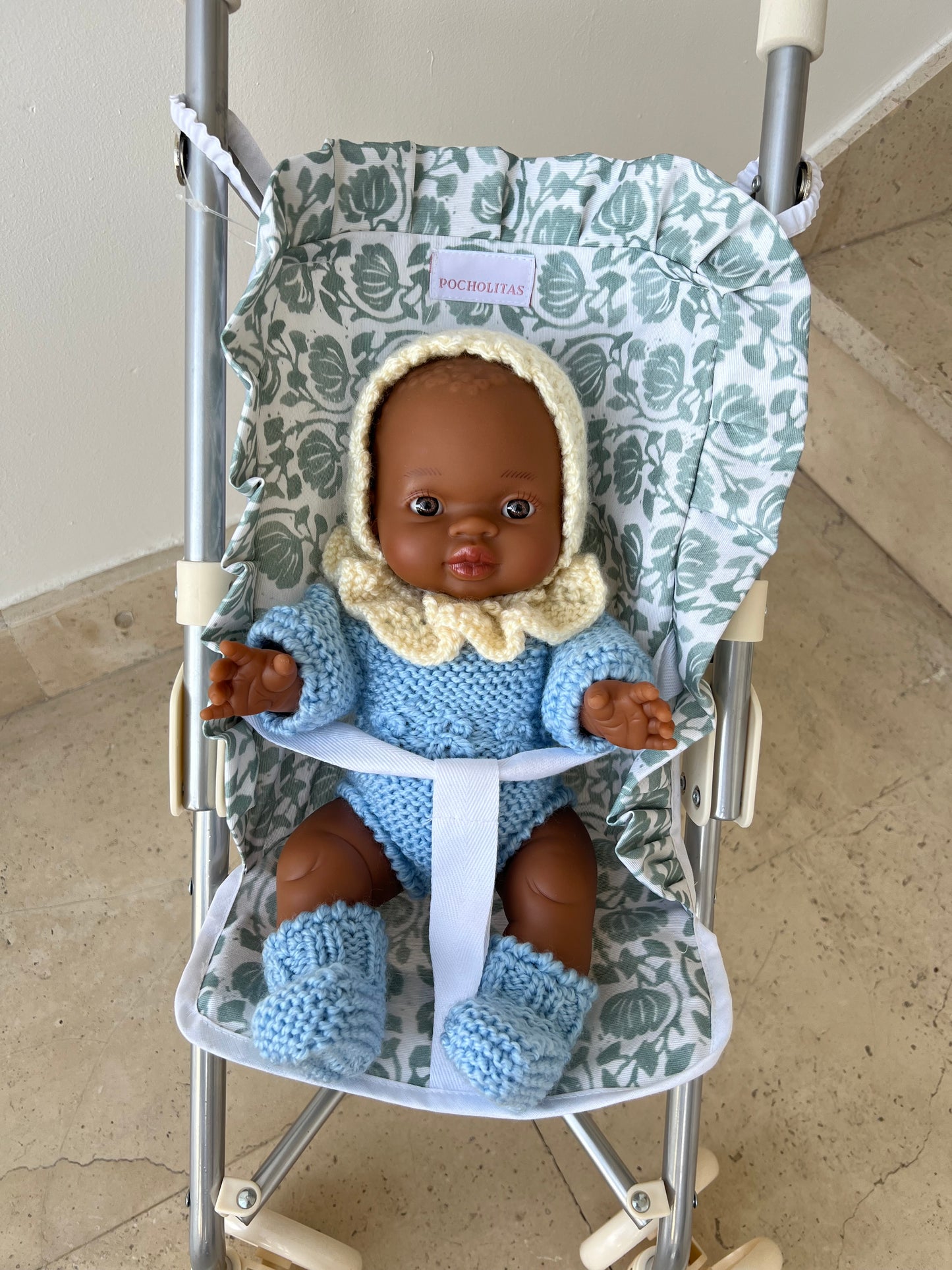 Silleta ligera plastificada azul de flores